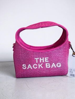 The  Sack Bag Combo Pink Woven Shoulder Bag & Wallet.